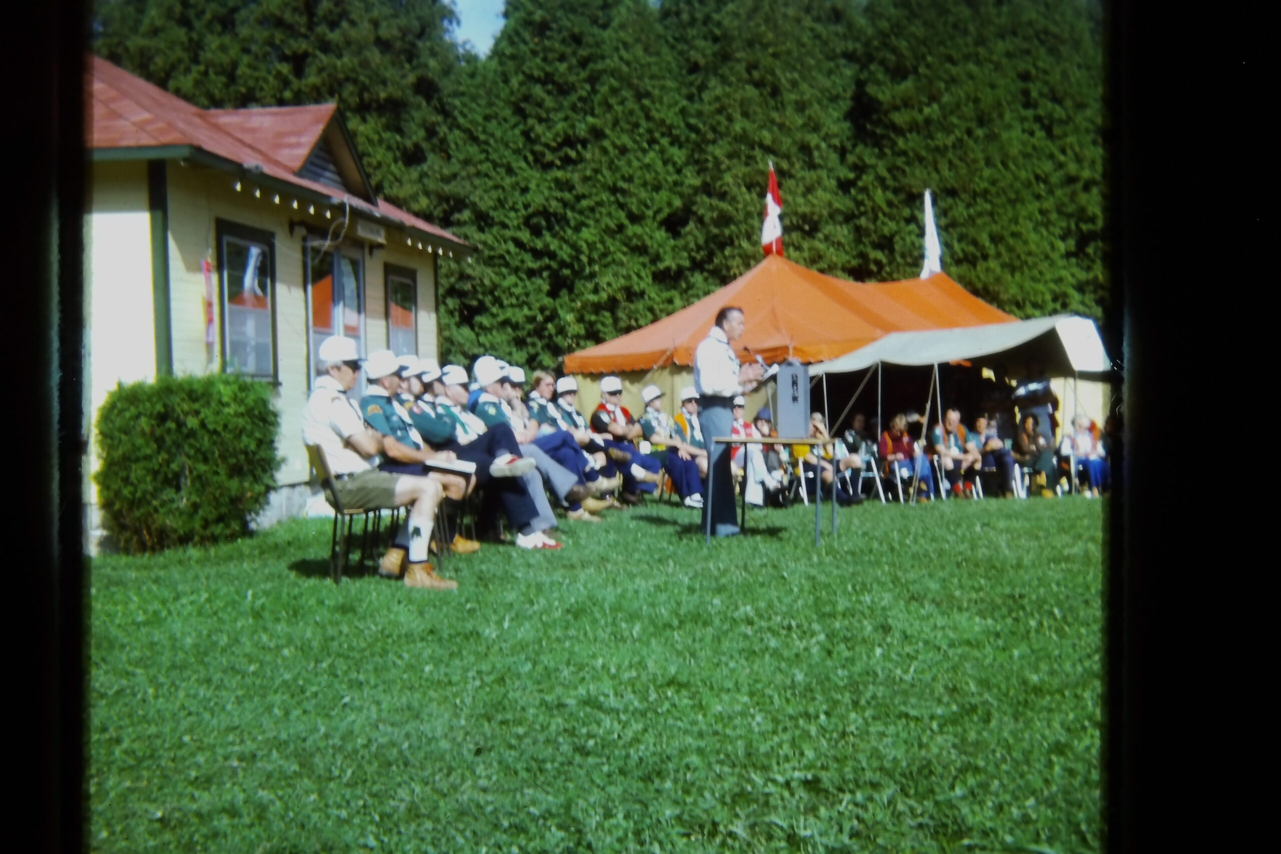 1977 committee with guest speaker, John MacGregor, at microphone