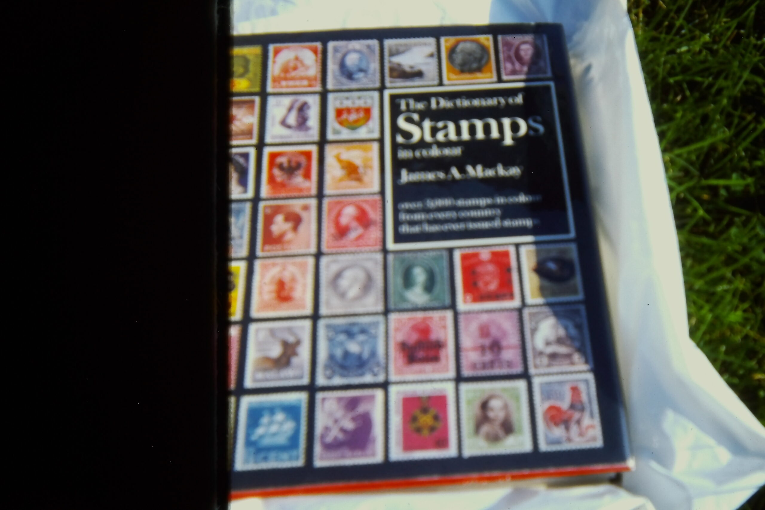 Book of stamps presented to Blue Springs library in memory of Wally Selby.