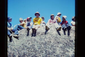Jean and Cubs on top of rock