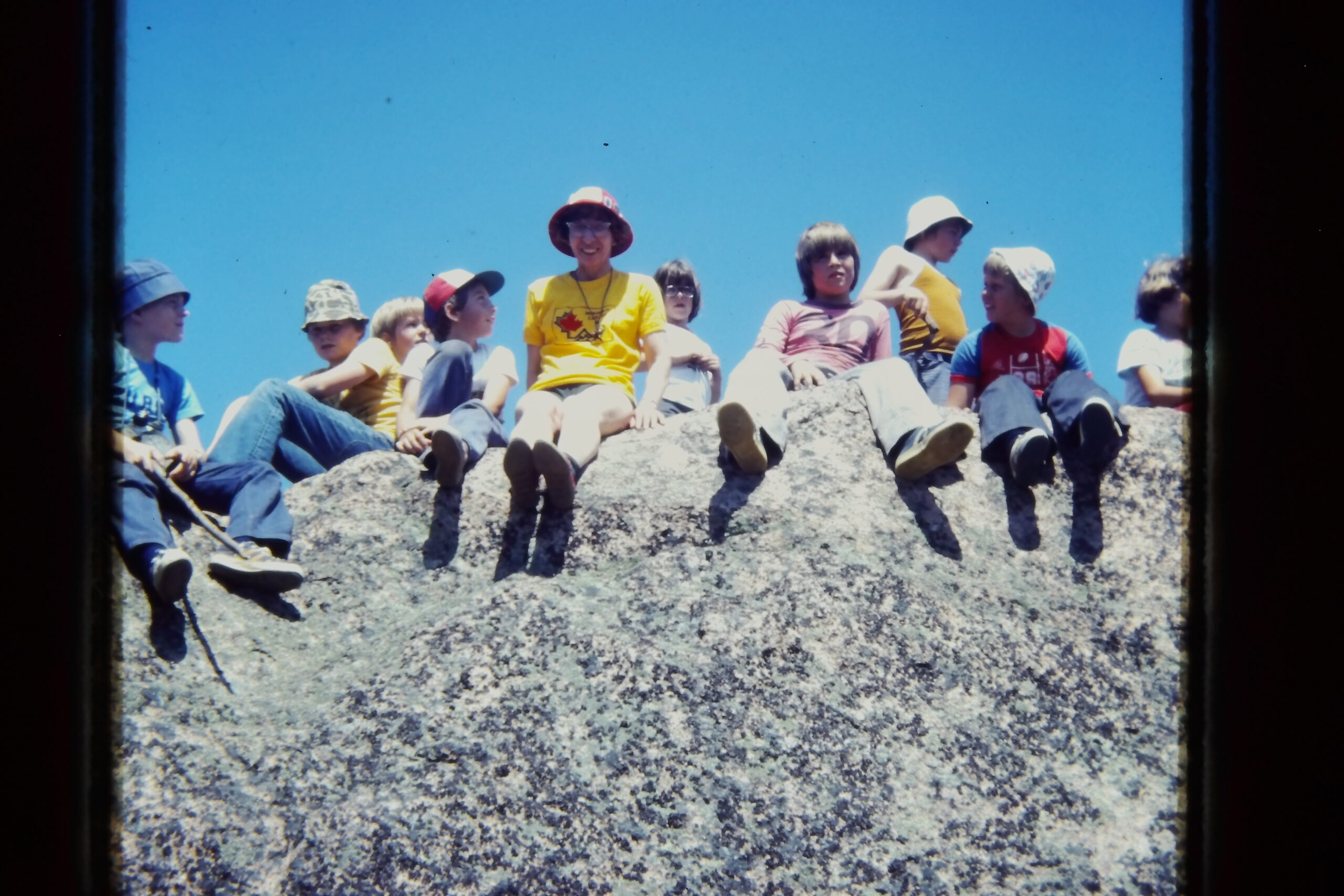 Jean and Cubs on top of rock