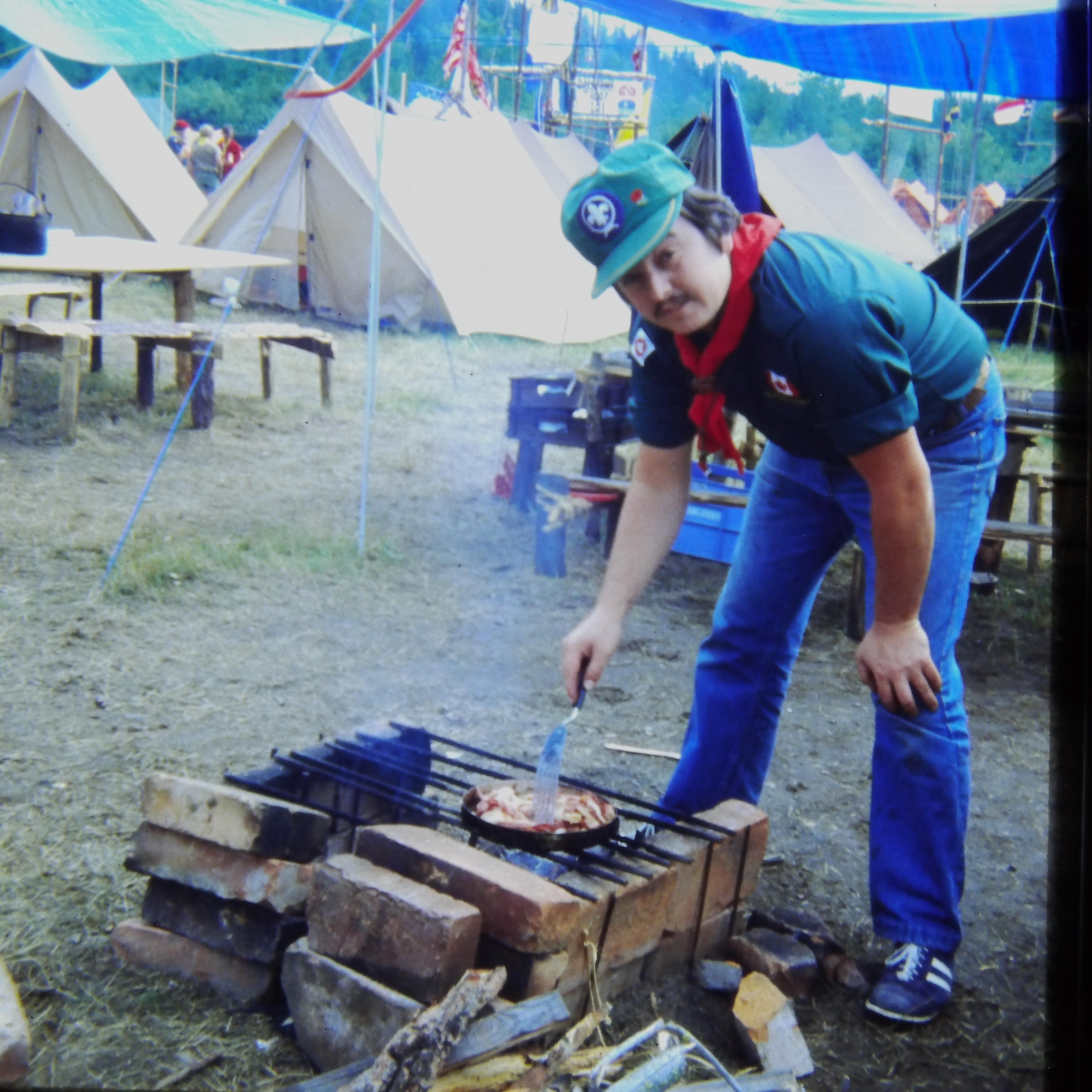 Canadian Scouter cooking bacon