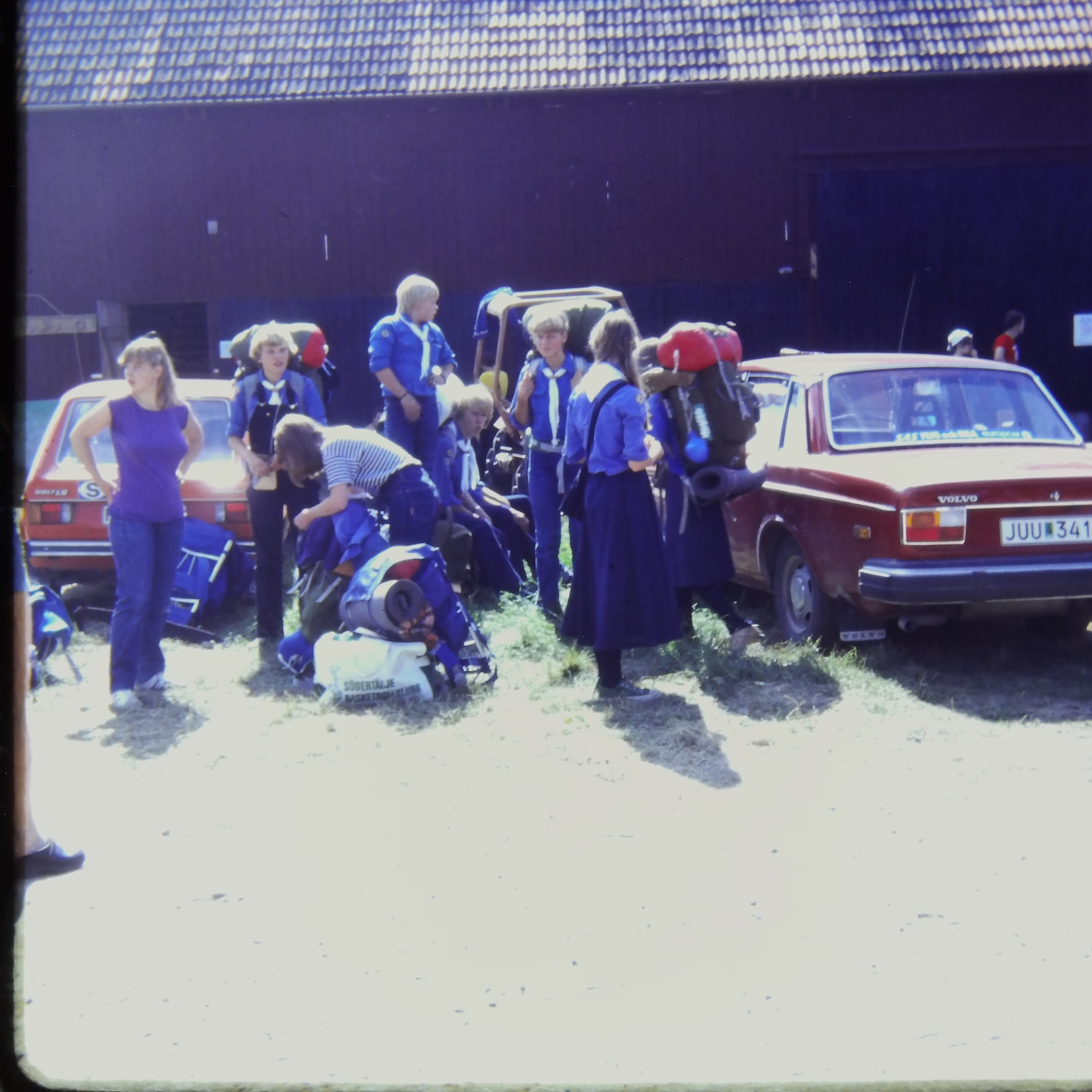 Girl Scouts unloading gear